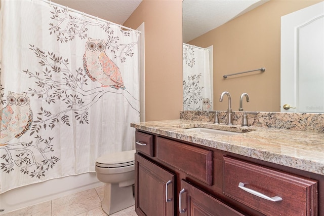 bathroom featuring toilet, vanity, tile patterned floors, shower / bath combination with curtain, and a textured ceiling