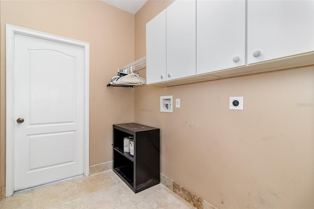 clothes washing area with baseboards, cabinet space, hookup for an electric dryer, and washer hookup