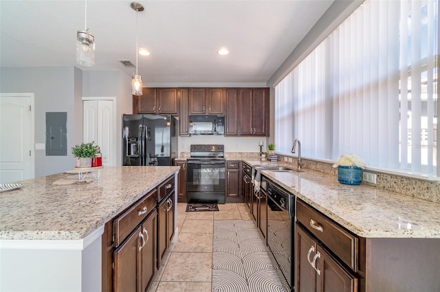 kitchen featuring a center island, pendant lighting, electric panel, black appliances, and a sink