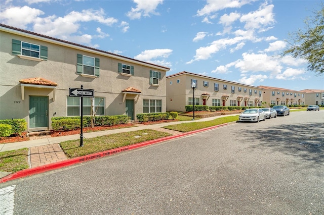 view of building exterior featuring a residential view