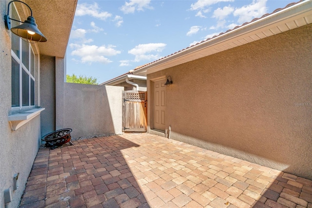 view of patio / terrace with a gate