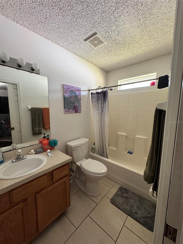 full bath with visible vents, shower / tub combo, a textured ceiling, tile patterned floors, and toilet