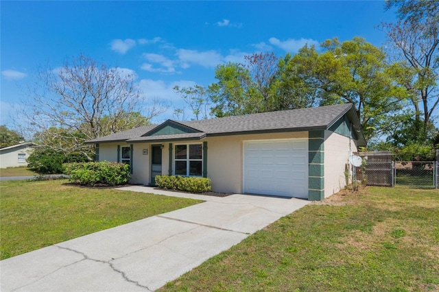 single story home featuring fence, driveway, an attached garage, stucco siding, and a front lawn