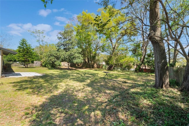 view of yard with a patio area and a fenced backyard