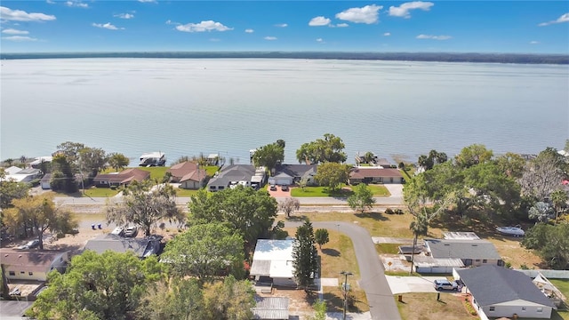 bird's eye view featuring a residential view and a water view