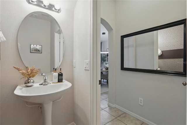 bathroom featuring tile patterned flooring