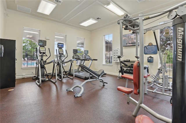 workout area with visible vents and baseboards