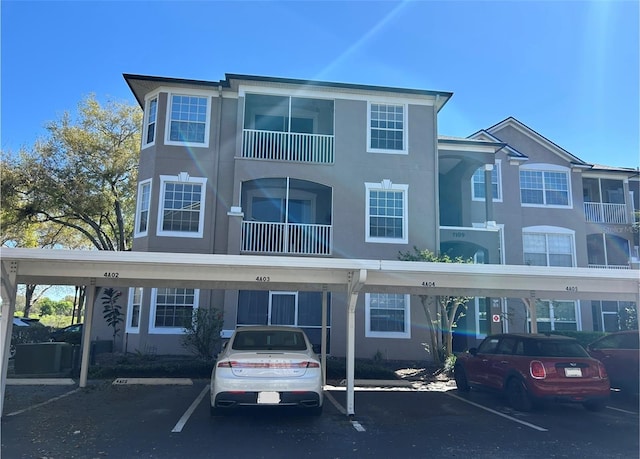 exterior space featuring covered parking