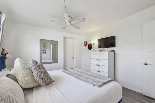 bedroom featuring ceiling fan and wood finished floors