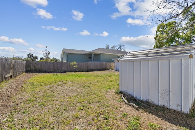 view of yard with a fenced backyard