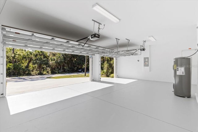 garage with electric panel, electric water heater, and a garage door opener