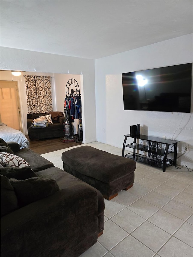 living area with light tile patterned flooring