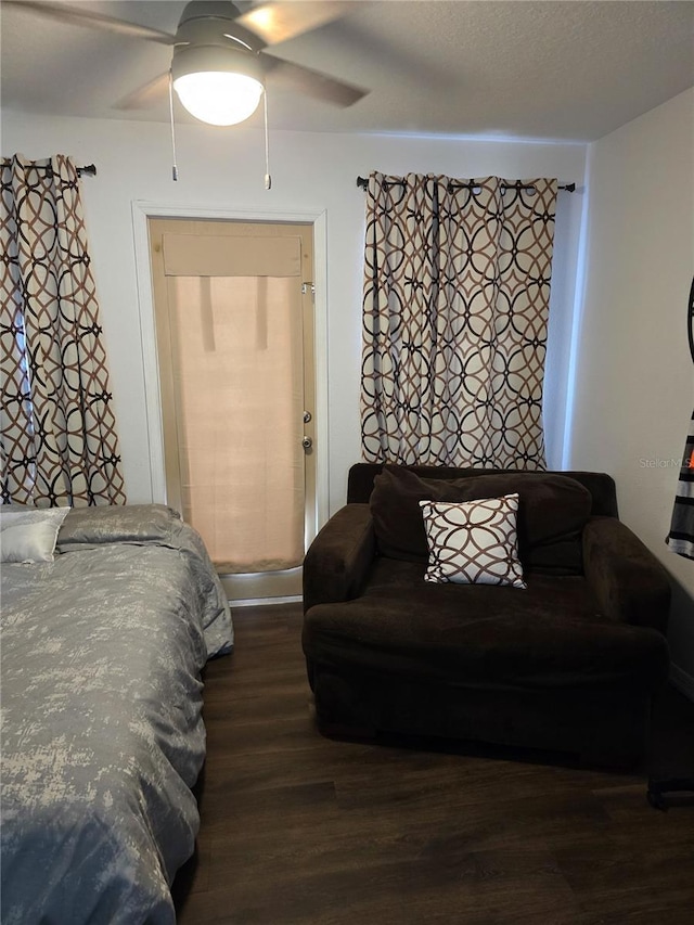 bedroom with a ceiling fan and wood finished floors