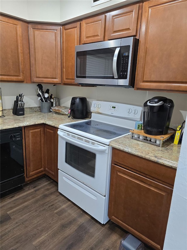 kitchen with brown cabinets, stainless steel microwave, white electric stove, dishwasher, and dark wood-style flooring