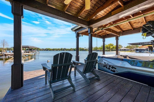 dock area featuring a water view