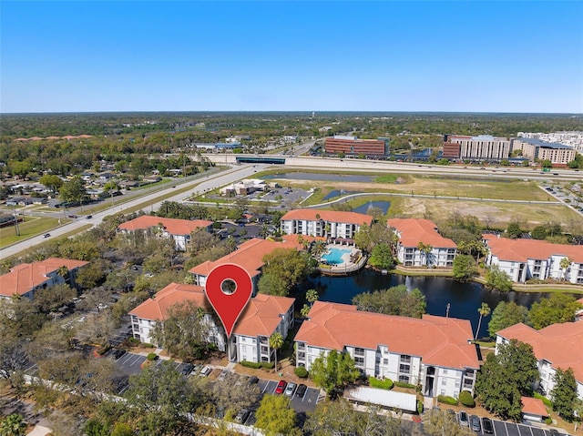 drone / aerial view featuring a water view