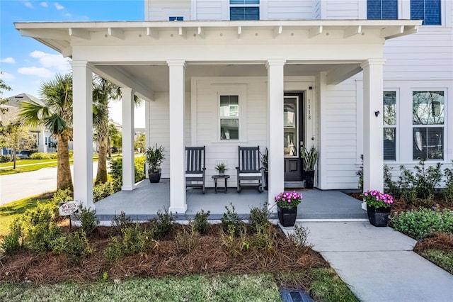 doorway to property with a porch