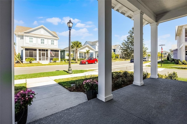 view of patio with a porch and a residential view