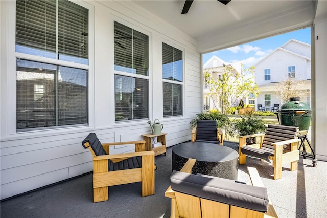 view of patio / terrace with area for grilling and ceiling fan