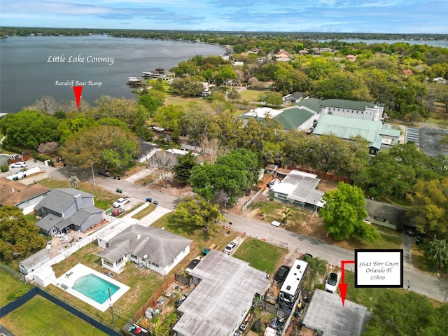 birds eye view of property with a water view