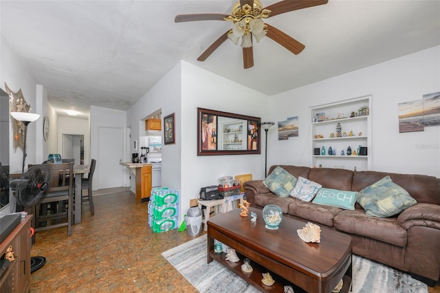 living room featuring a ceiling fan