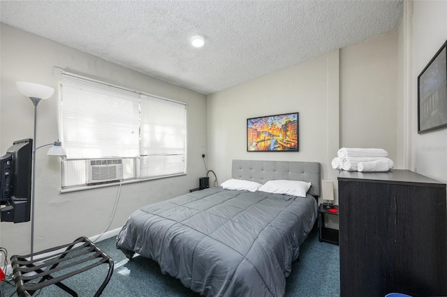 bedroom with vaulted ceiling, cooling unit, a textured ceiling, and carpet floors