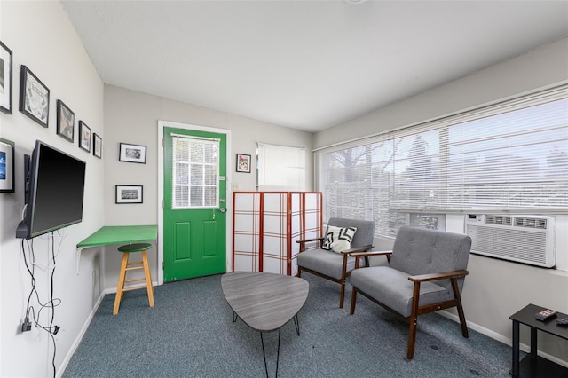 living area with carpet and baseboards