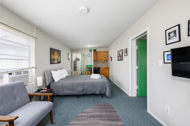 bedroom featuring cooling unit, baseboards, and carpet flooring