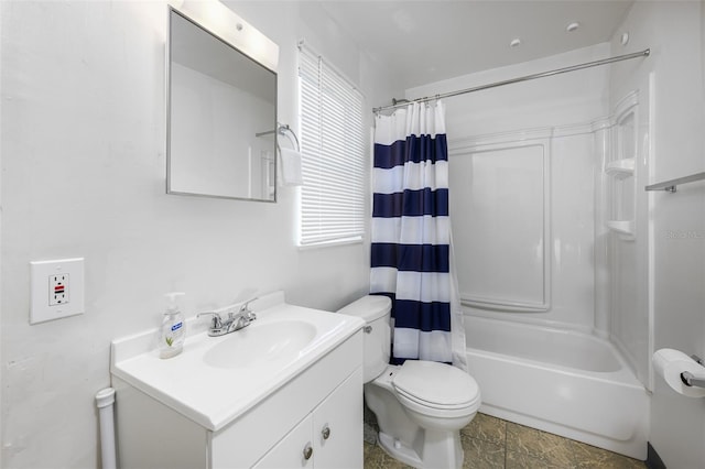 bathroom featuring vanity, shower / bath combination with curtain, and toilet