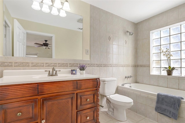 full bath featuring tile patterned flooring, a healthy amount of sunlight, tile walls, and toilet