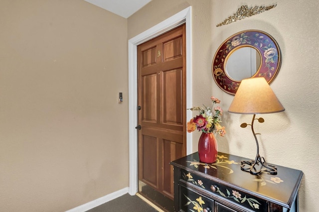 foyer entrance with baseboards