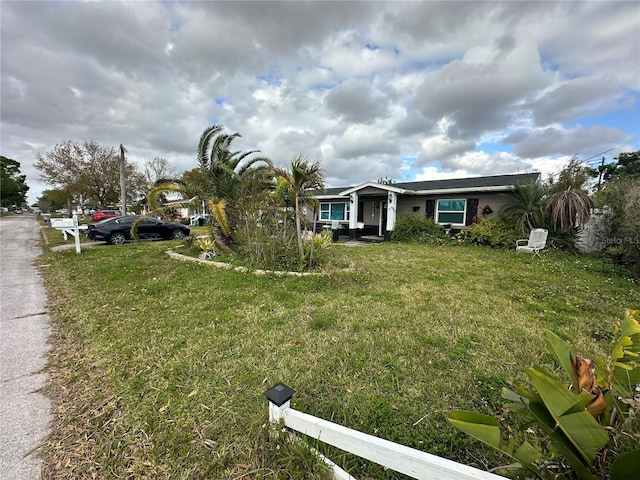 view of front of property with a front lawn