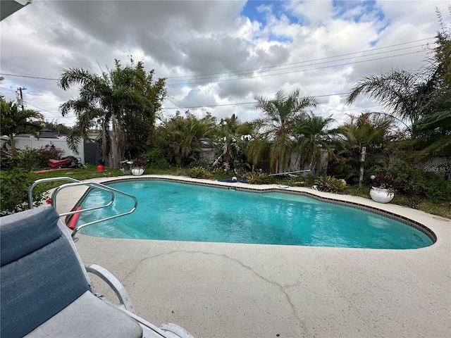 pool with a patio