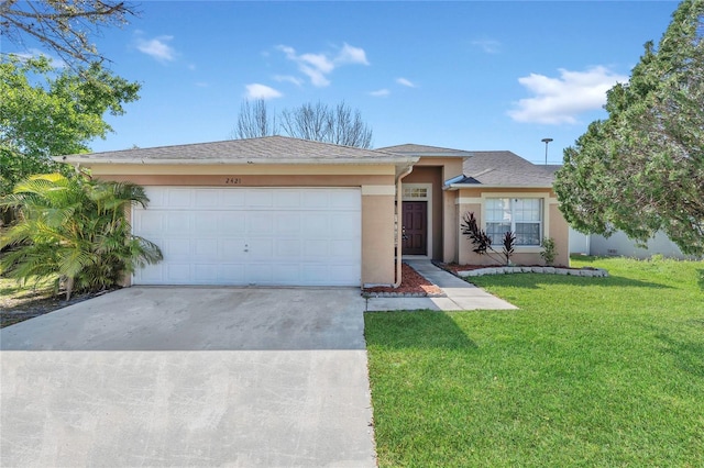 ranch-style house with a front yard, a garage, driveway, and stucco siding