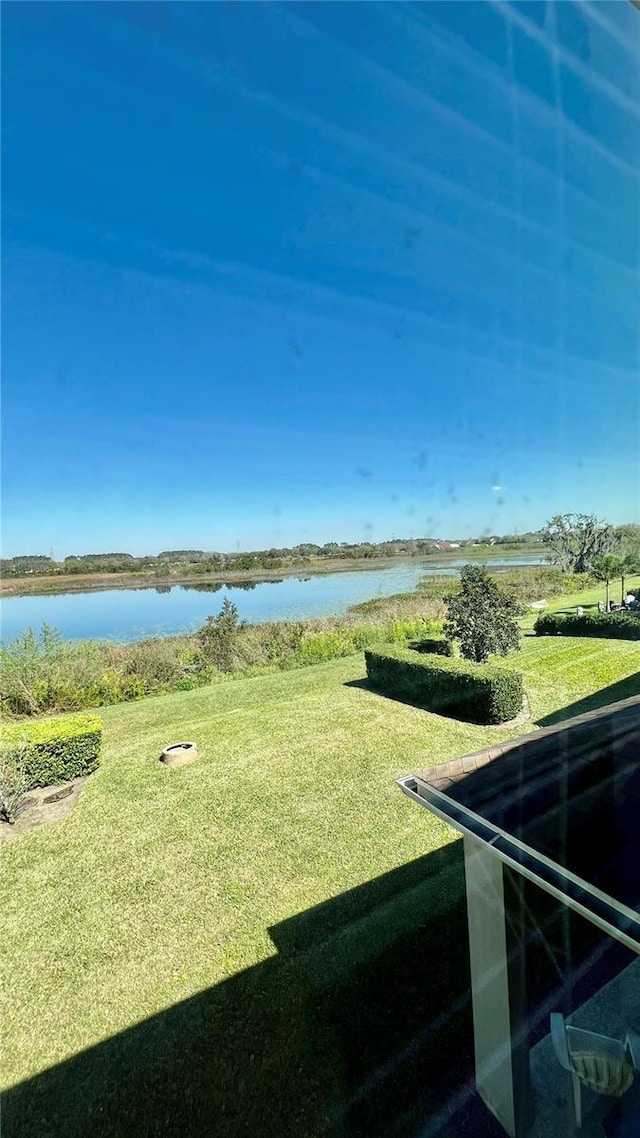 view of yard with a water view