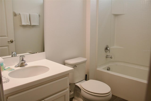 bathroom featuring vanity, shower / tub combination, and toilet