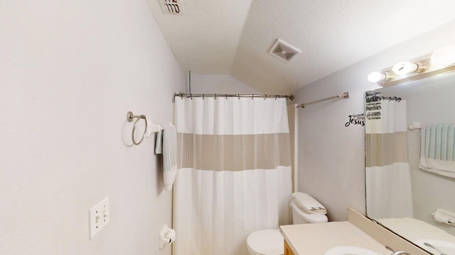 bathroom with visible vents, curtained shower, toilet, and vanity