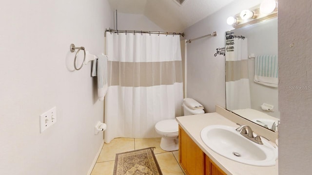 bathroom with visible vents, toilet, curtained shower, tile patterned flooring, and vanity