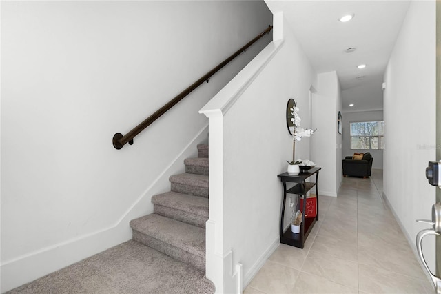 stairs with tile patterned flooring, recessed lighting, and baseboards