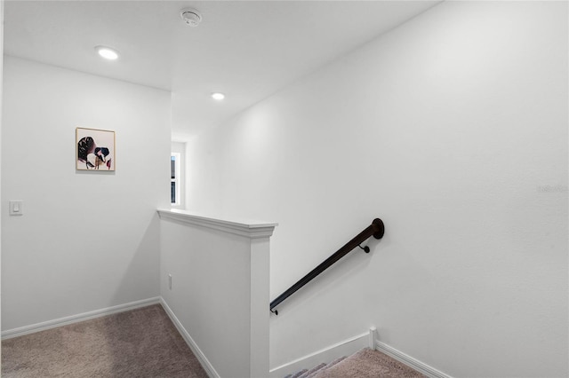 stairs with recessed lighting, baseboards, and carpet flooring