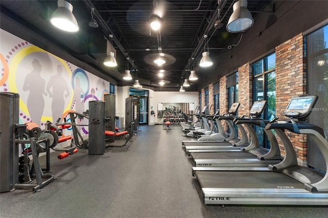 gym with brick wall