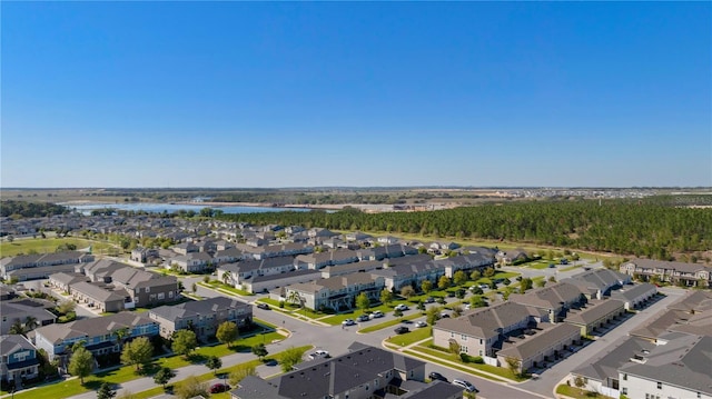 aerial view with a residential view and a water view