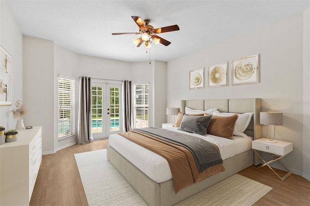 bedroom featuring access to exterior, ceiling fan, baseboards, light wood-type flooring, and french doors