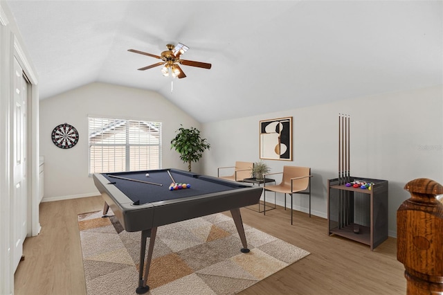 game room featuring pool table, baseboards, light wood-style floors, and vaulted ceiling