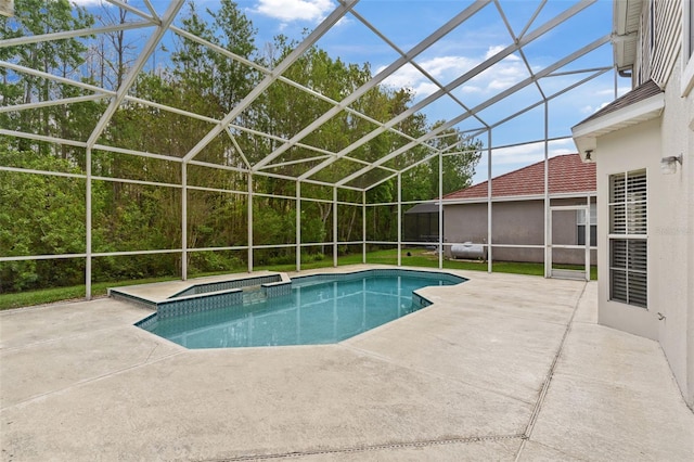 pool with a patio area and glass enclosure