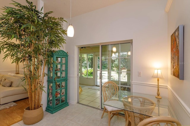 doorway featuring a wainscoted wall