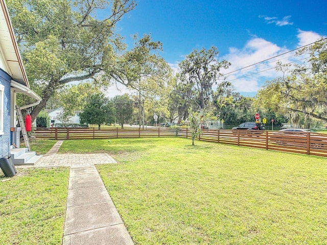 view of yard with fence