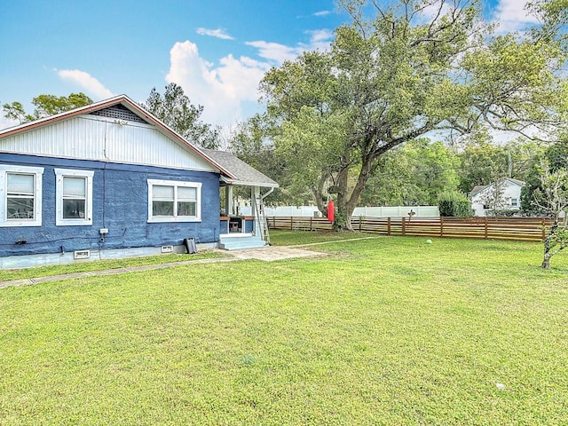 view of yard with fence