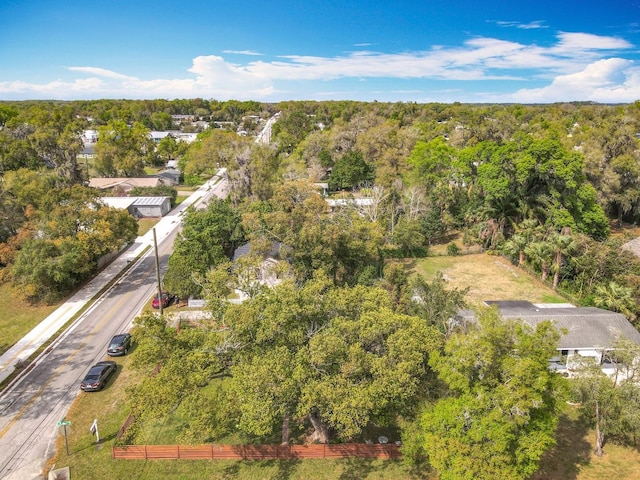 aerial view featuring a view of trees