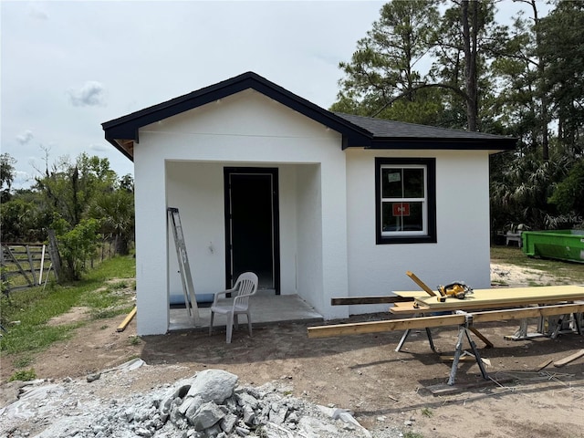 3027 Turkey Ave, Oviedo, FL 32765 - rear view of property with fence and stucco siding